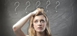 confused woman--question marks